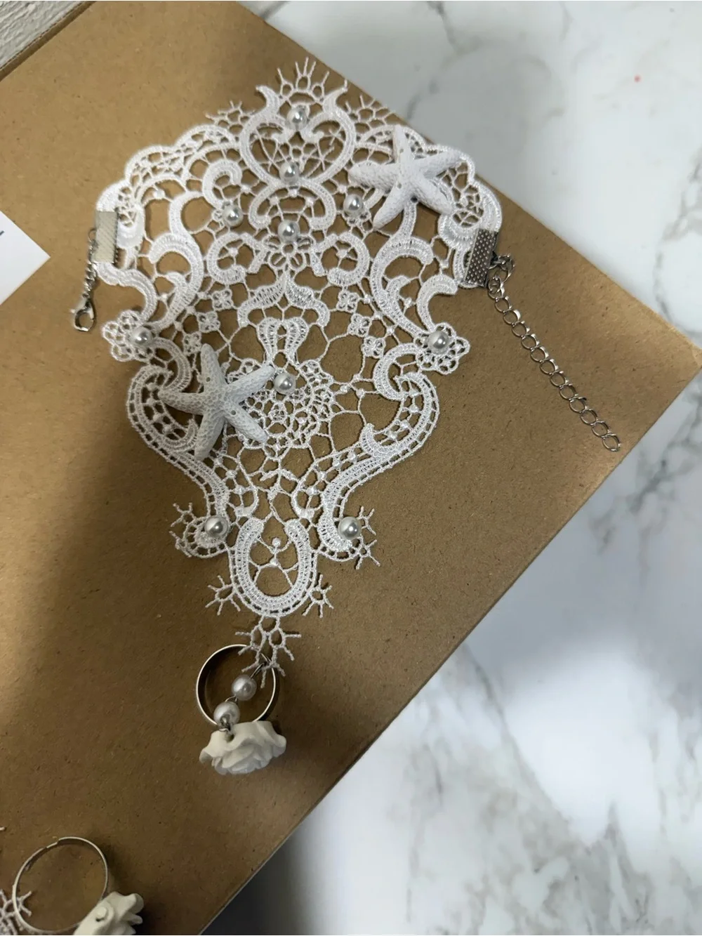 Delicate White Lace Bridal Fingerless Gloves with Floral Accents